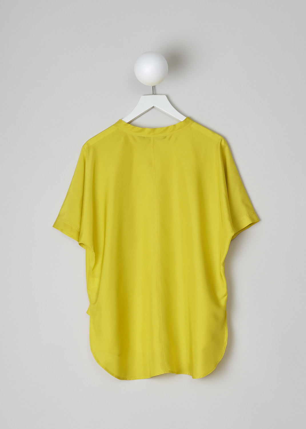 SOFIE D’HOORE, BRIGHT YELLOW SILK TOP, BAGEL_SOHO_BUTTERCUP, Yellow, Back, The bright yellow silk top has a round neckline and short sleeves. The top has a rounded hemline with an asymmetrical finish, meaning the back is a little longer than the front. 
