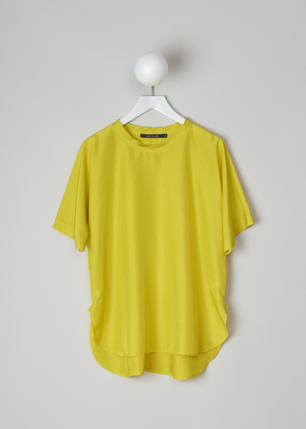 SOFIE D’HOORE, BRIGHT YELLOW SILK TOP, BAGEL_SOHO_BUTTERCUP, Yellow, Front, The bright yellow silk top has a round neckline and short sleeves. The top has a rounded hemline with an asymmetrical finish, meaning the back is a little longer than the front. 

