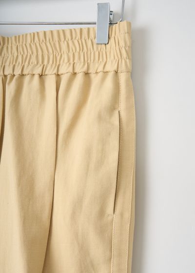 Brunello Cucinelli Pale yellow jogger-style pants