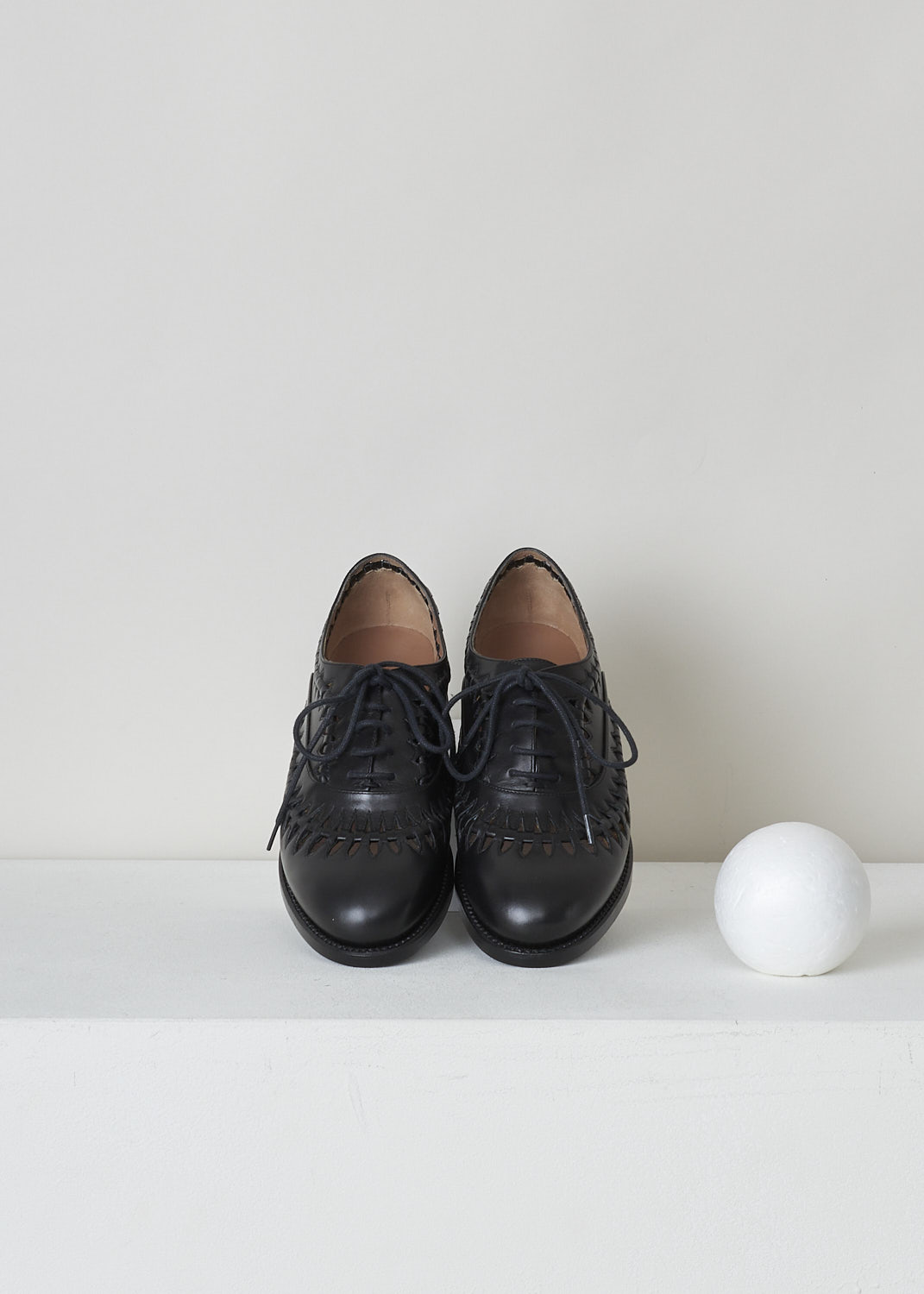 ALAÏA, BLACK OPENWORK DERBY SHOE, 4W3D128CB05_C999_NOIR, Black, Top, These black leather derby shoes have an intricate openwork laser-cut pattern. They have a round nose, a classic lace-up closing with black laces and a small heel. 

