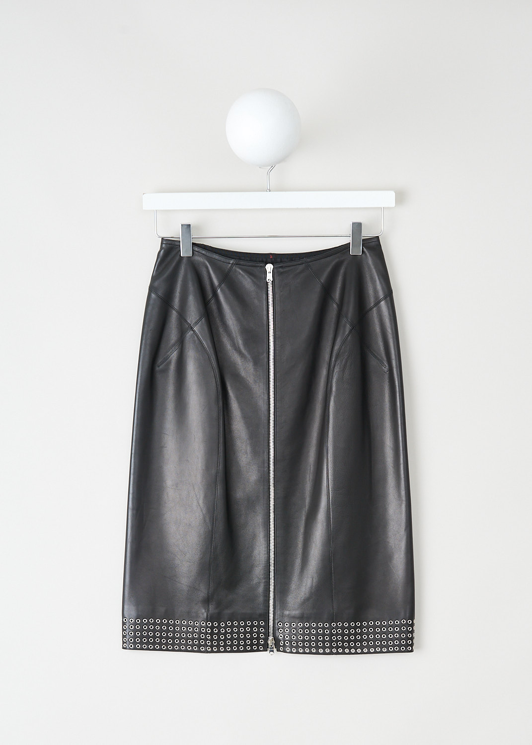 Alaïa, Black leather midi skirt with silver detailing, 6W9J347R__C013_AGNEAU_PLONGE_C999_NOIR, Black, Back, This black leather midi skirt has a silver-tone two-way zip closure in the back. Along the hem, the skirt is decorated with silver-tone eyelets. 
