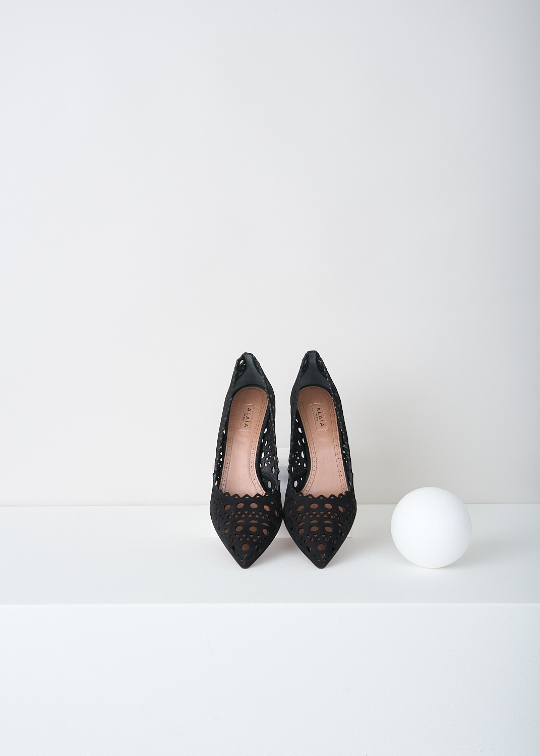 Alaïa, Black suede pumps with laser-cutouts, AA3E006C0H53_999_NOIR, Black, Top, The black suede pumps have a pointed toe. These open-work pumps have Vienne laser-cutout throughout. 
