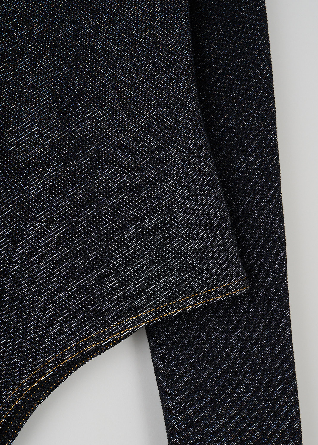 Alaïa Dark grey denim turtleneck bodysuit, AA9B02344M824_991_NOIR_BLANC, Grey, Detail, This skin tight dark grey denim bodysuit has a turtleneck and long sleeves with straight endings. The body has a press button closure in the crotch. 
