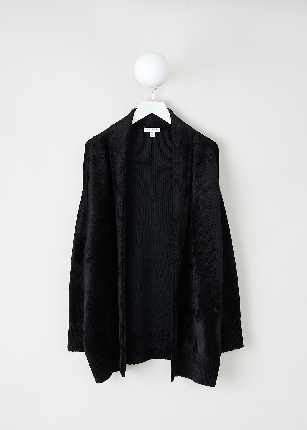 Alaïa, Black shiny velvet knit cardigan, AA9S02956M914_995_NOIR_ALAIA, Black, Front, This black shiny velvet knit cardigan has long sleeves and an open front. This cardigan is designed for a loose fit.
