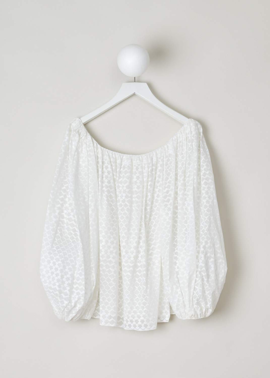 Alaïa, Slightly see-through oversized top in white, AS9U213RT314_C000_blanc, white, back, A lovely oversized top decorated with a white lozenge motif. Made entirely from a thinly woven cotton, making this top slightly see through. Furthermore, this model comes with a boat neckline which leads into the long balloon sleeves.