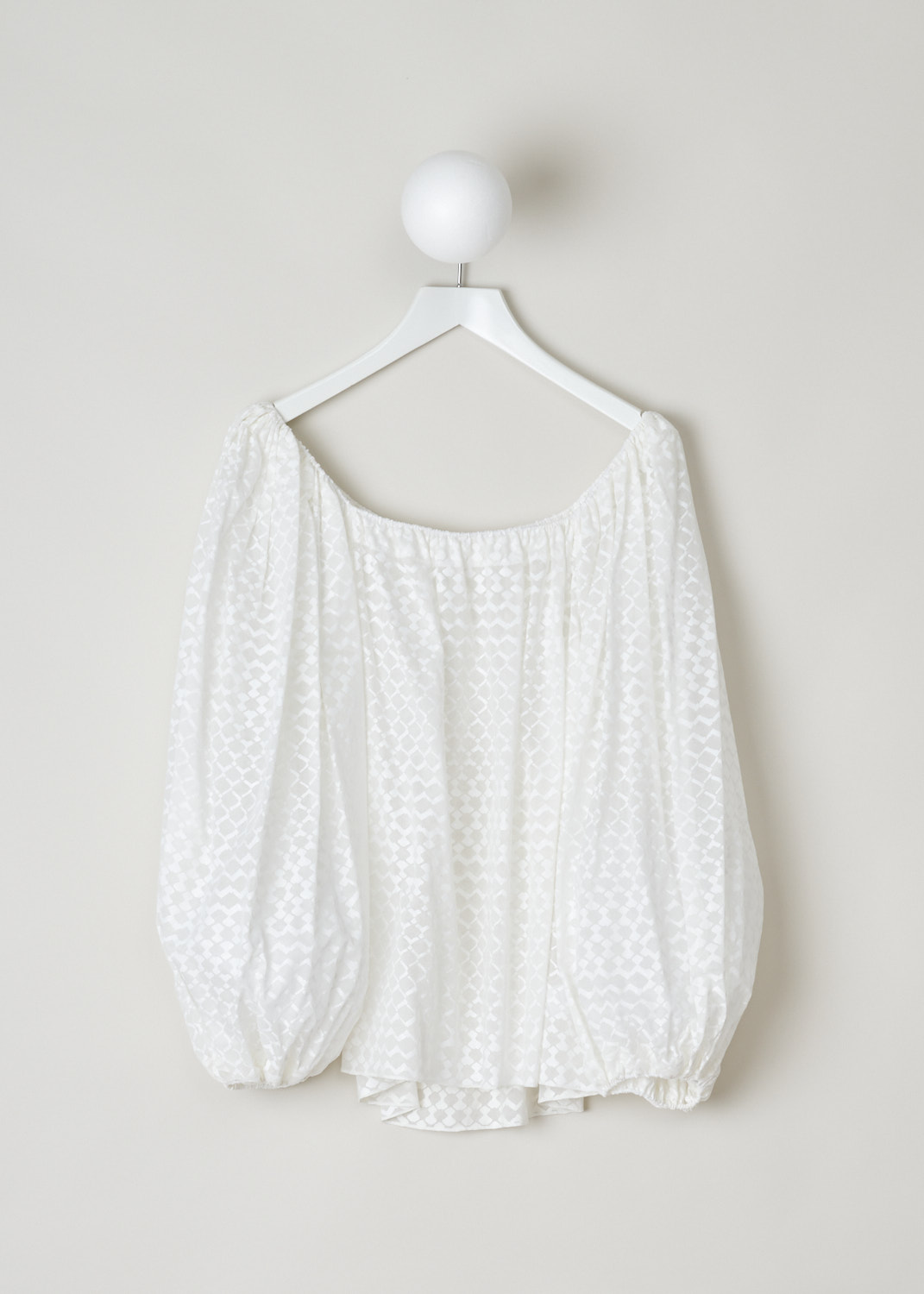 AlaÃ¯a, Slightly see-through oversized top in white, AS9U213RT314_C000_blanc, white, front, A lovely oversized top decorated with a white lozenge motif. Made entirely from a thinly woven cotton, making this top slightly see through. Furthermore, this model comes with a boat neckline which leads into the long balloon sleeves.