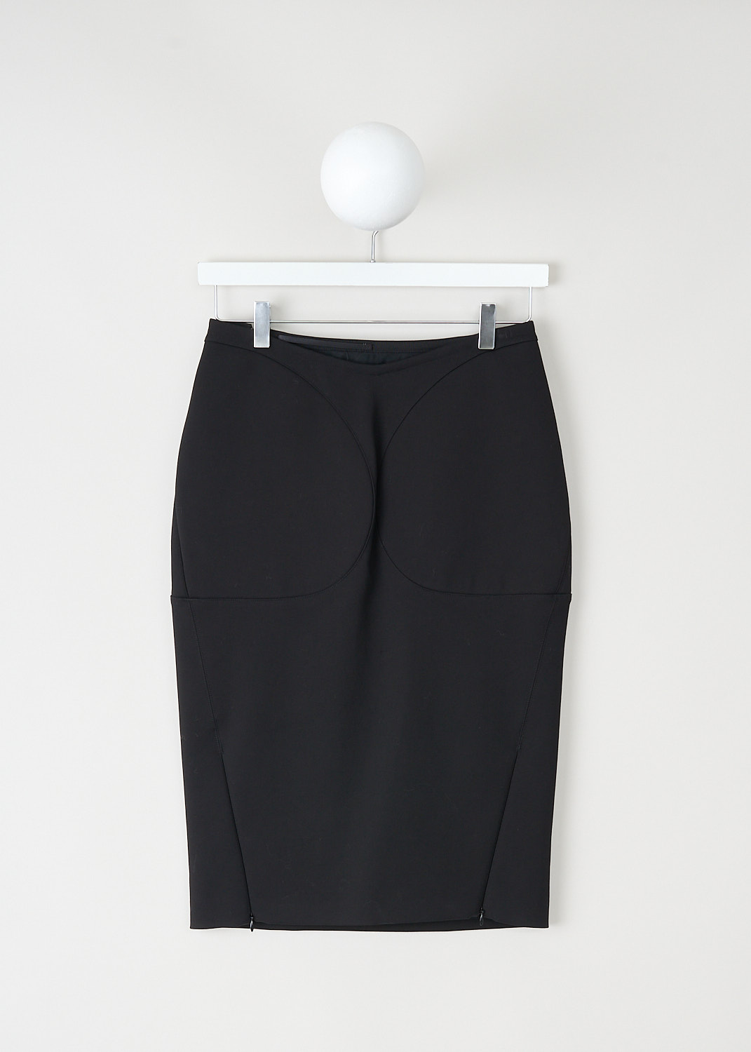 Alaïa, Black pencil skirt with padded inserts, AA9J05215T621_995_NOIR_ALAIA, Black, Back, This black midi pencil skirt has padded inserts on the front and back. A concealed zip runs diagonally from the front into the side seam. In thee back, the skirt has two concealed zips that can functions as slits.
