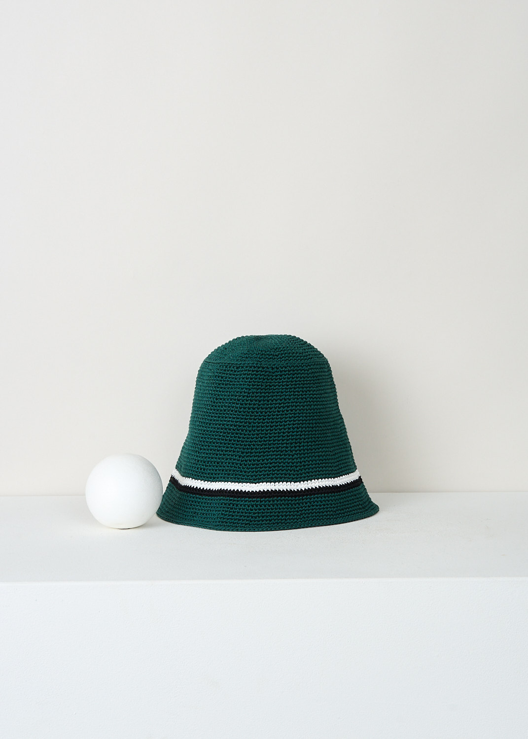 B.B. Wallace Schnabel dark green crocheted cotton hat with contrasting black-and-white trim, designer accessory at Kiki’s Stocksale Maastricht