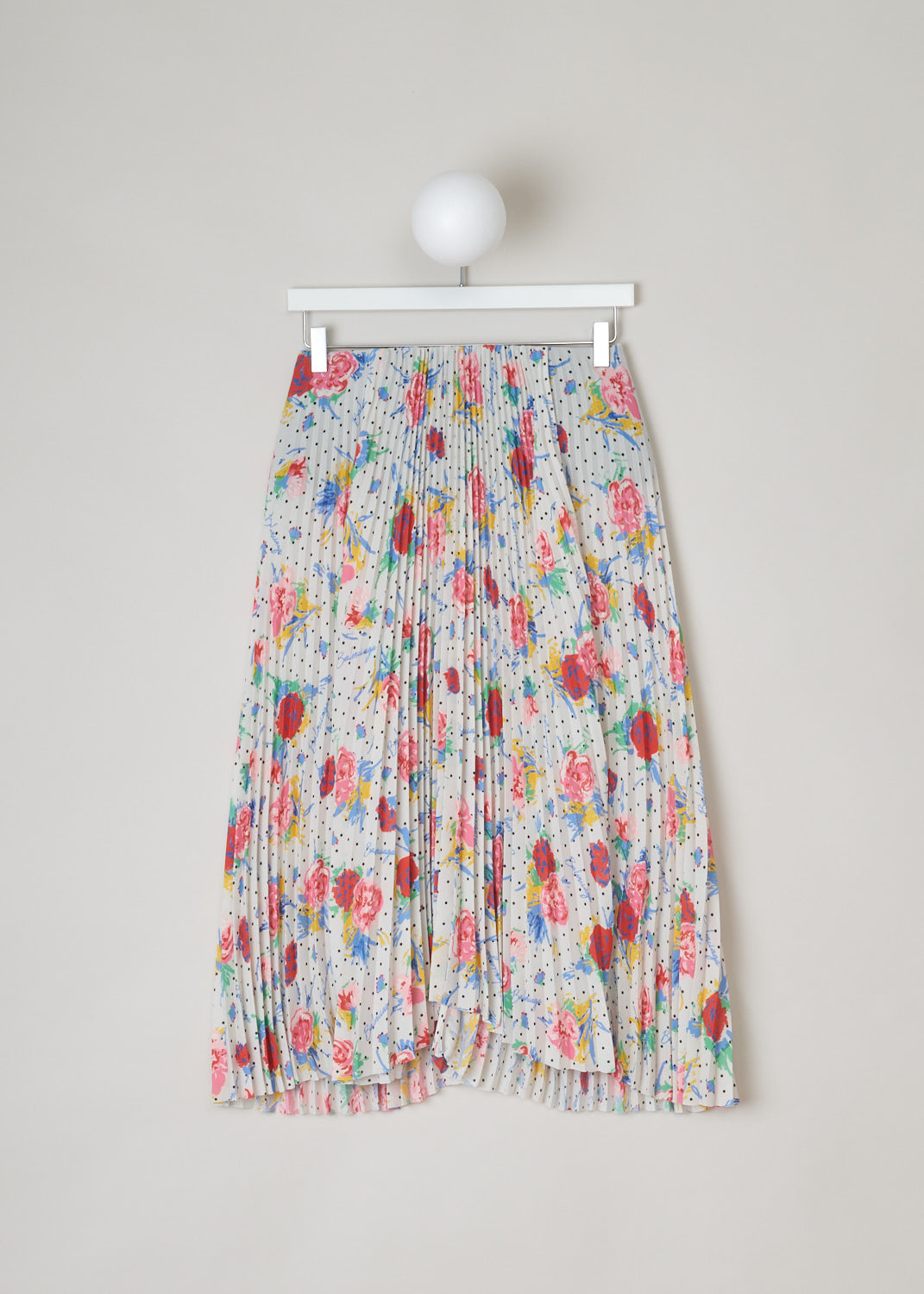 Balenciaga, Polka dot floral plissé skirt, 601169_THL07_9701, white red yellow green blue, front. This high-waisted multi-colored plissé skirt comes with a floral design pattern and polka dots through-out. The closure options on this piece are 2 metal hooks and beneath that a concealed zipper.