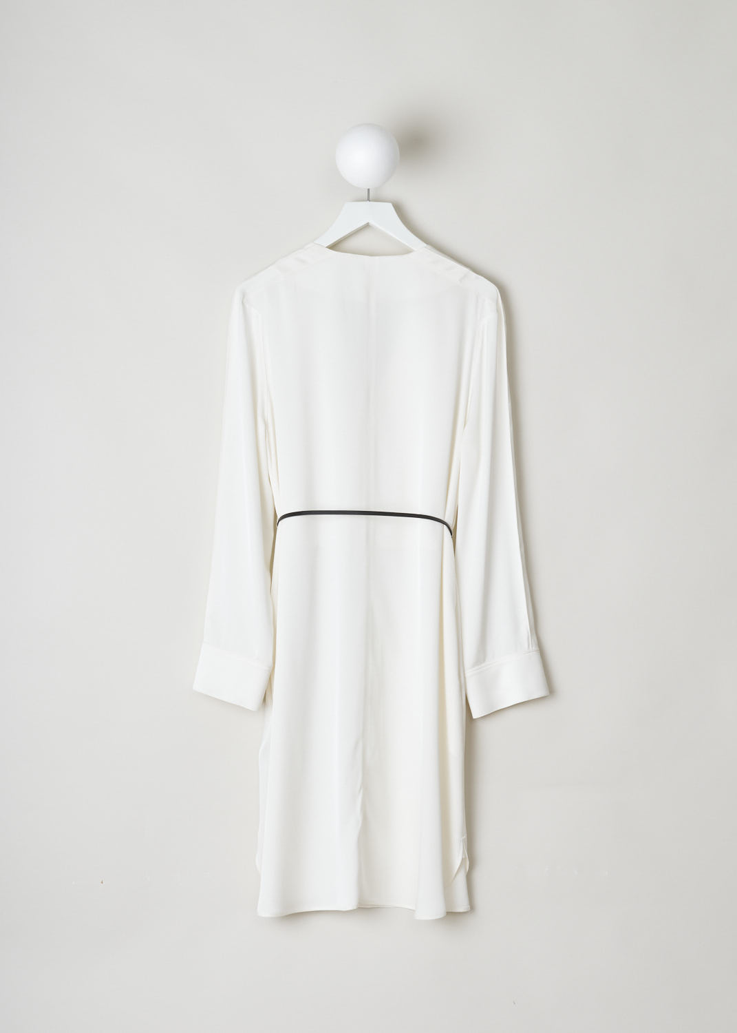 BOTTEGA VENETA, WHITE SILK DRESS WITH CONTRASTING BELT, 606454_VKJ90_8329, White, Back, This silky smooth, long sleeved dress has a deep V-neck with an exaggerated pliable collar. Across the shoulders, dainty little pleats can be found. The dress comes with a thin, contrasting black belt in leather, with its belt buckle being the recognizable gold-toned triangle.  
