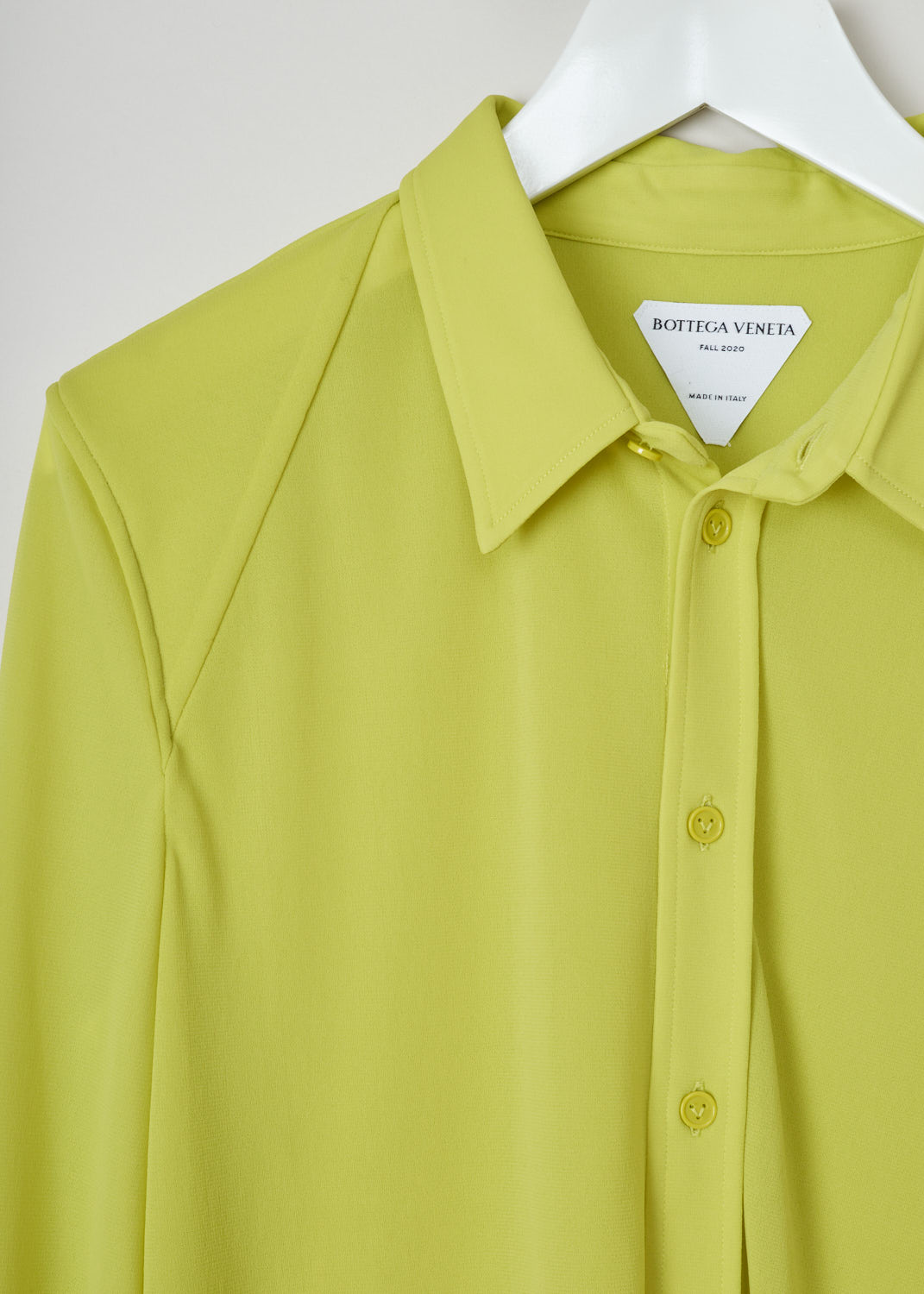 Bottega Veneta, See through yellow blouse, 636591_V0210_7275, yellow, detail, Designed with a oversized fit in mind. Featuring a pointed collar, long cuffed sleeves with three buttons on them. And a straight hem with two short splits on the side seam. Keep in mind that the fabric is slightly see through.
