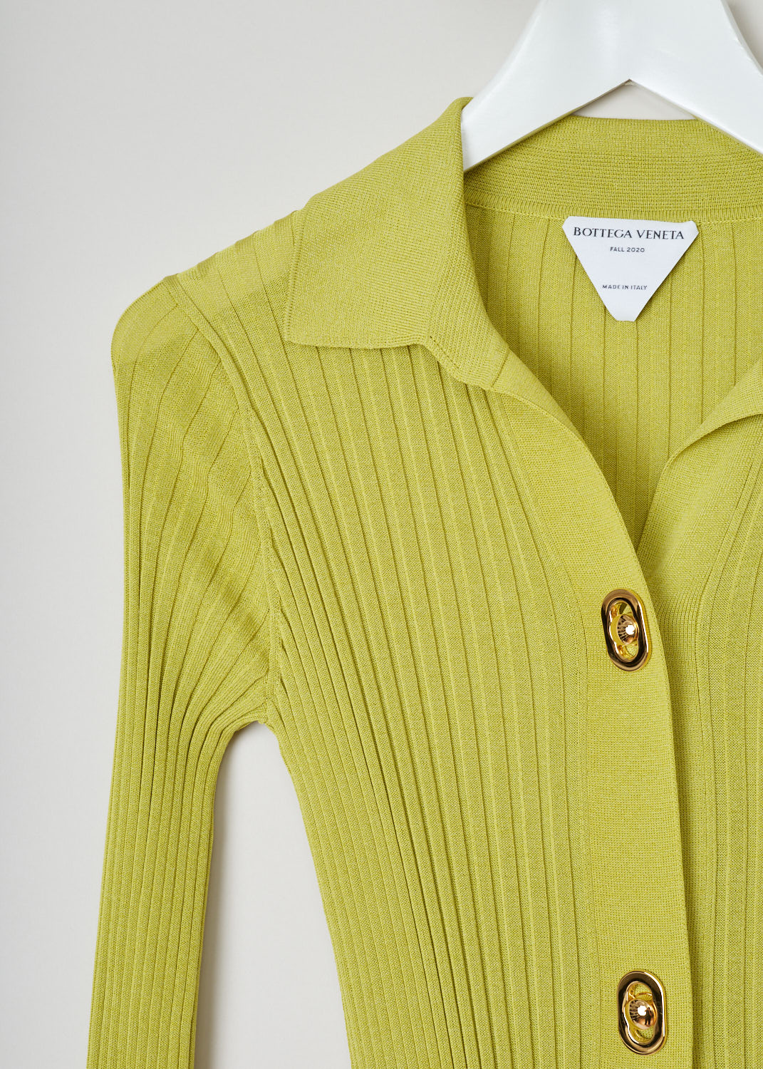 Bottega Veneta, Yellow ribbed blouse dress, 637824_V06P0_7275, yellow, detail, Skin tight blouse dress featuring a ribbed weaving pattern, pointed collar and long cuffed sleeves supporting a single button. The fastening option on this model are the decorative press buttons on the front. 