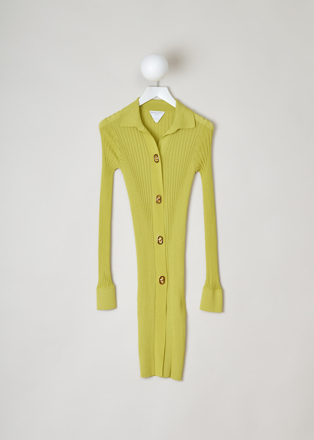 Bottega Veneta, Yellow ribbed blouse dress, 637824_V06P0_7275, yellow, front, Skin tight blouse dress featuring a ribbed weaving pattern, pointed collar and long cuffed sleeves supporting a single button. The fastening option on this model are the decorative press buttons on the front. 