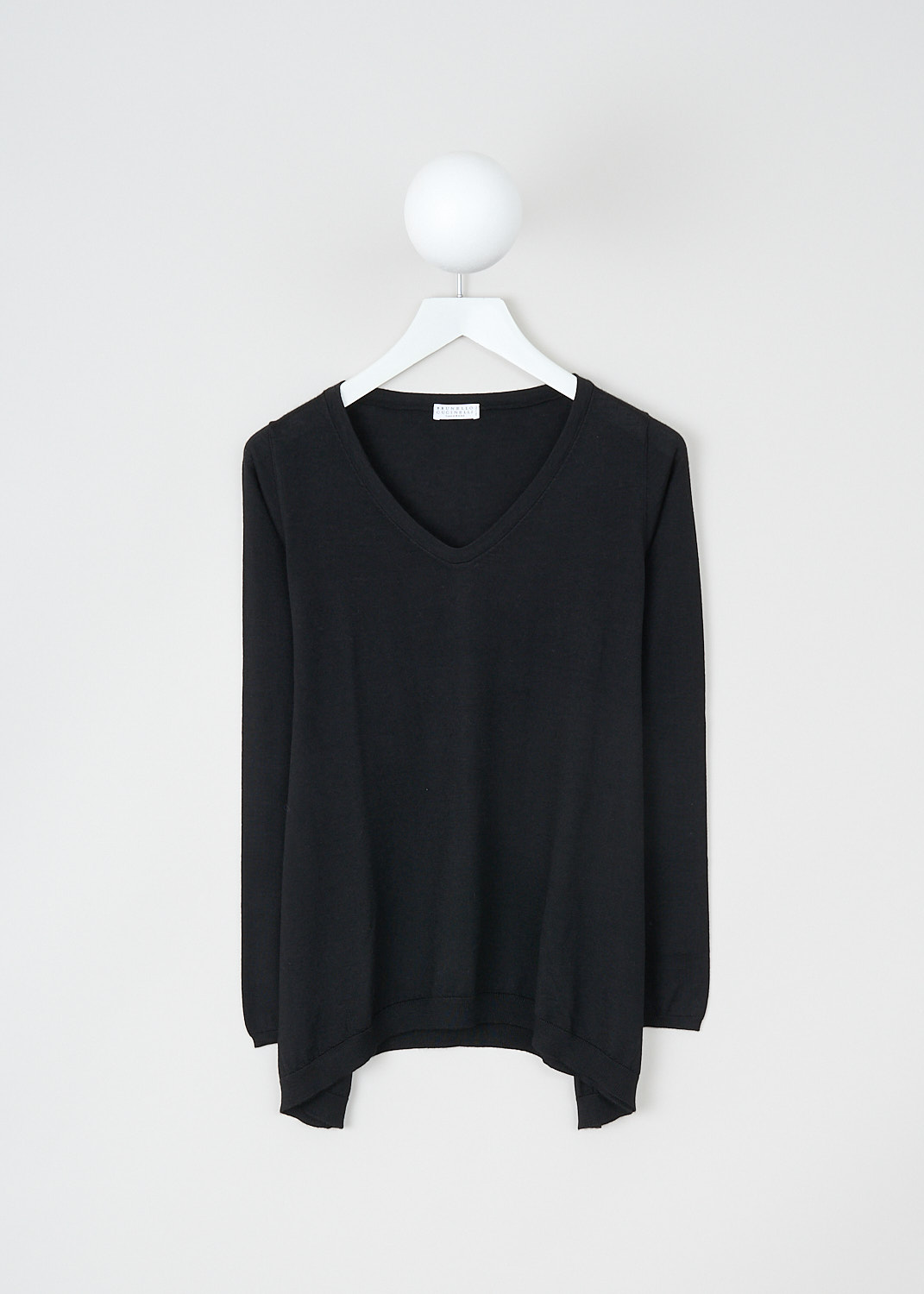 Brunello Cucinelli, Black A-line cashmere top, M13807922_C101, Black, Front, This black cashmere top has a ribbed V-neckline and long sleeve with ribbed cuffs. The top has a wide A-line silhouette with a ribbed handkerchief hemline.  
