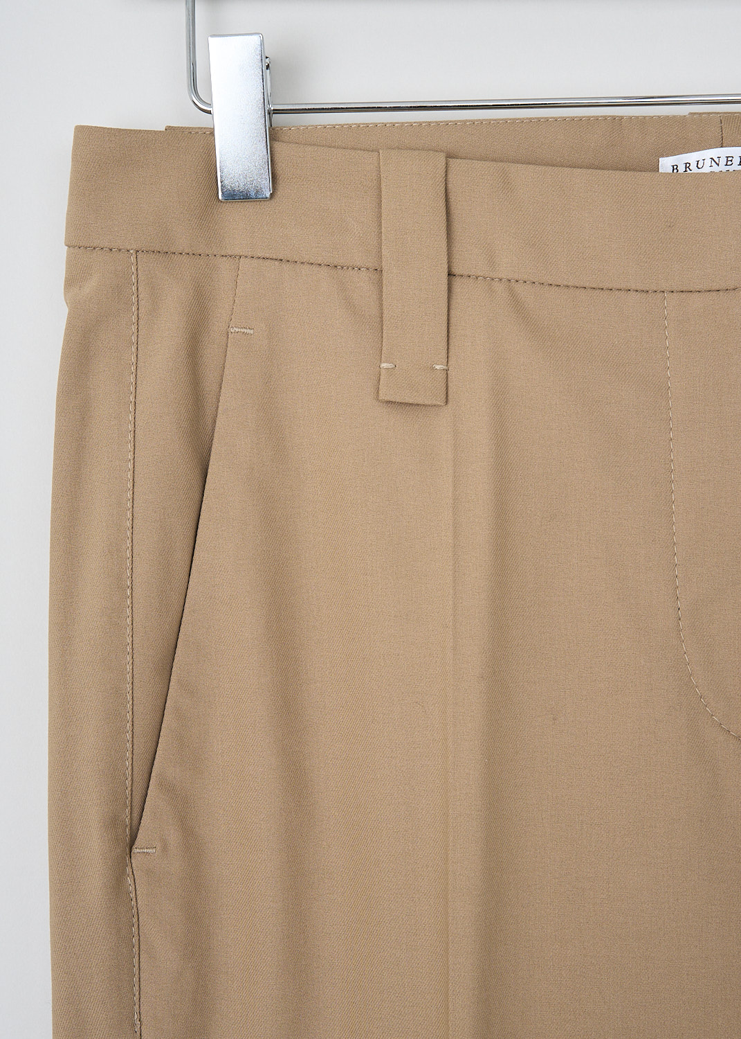 Brunello Cucinelli, Brown tapered pants with broad hem, M0F70P1365_C7178, Brown, Detail, These light brown tapered pants have a waistband with belt loops and a concealed front zip closure. These pants have slanted pockets in the front and welt pockets in the back. The tapered pant legs have a broad hem. 
