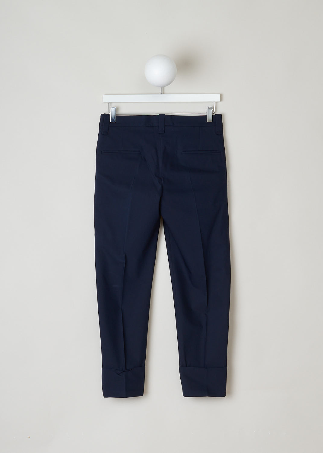 Brunello Cucinelli, Navy chino with fold-over hem, M0F70P1367_C7040, blue, back, A navy chino made of a cotton blend. Featuring forward slanted pockets on the front, and two welt pockets on the back. furthermore the belt loops are a bit broader then usual. 