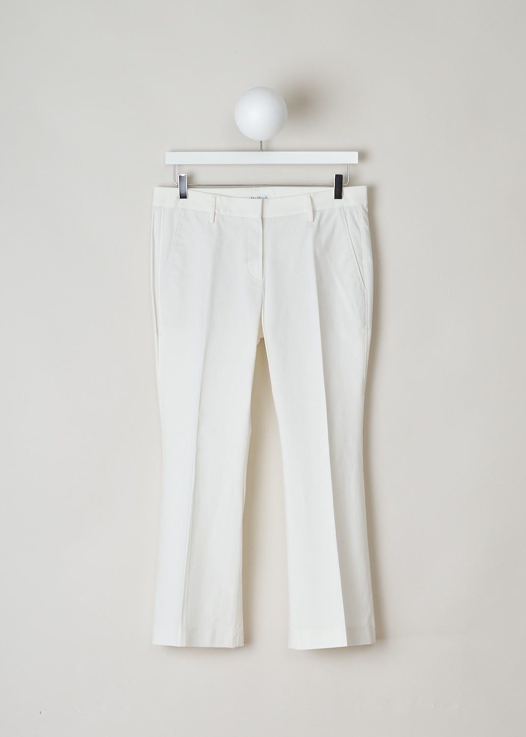 Brunello Cucinelli, Off-white boot-cut chino, M0F70P1951_7025, white, front, Made in the flat front model, with boot-cut legs. Furthermore, this model has two forward slanted pockets on the front and two jetted pockets on the back.