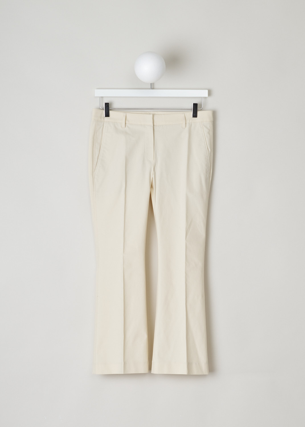 Brunello Cucinelli, Cream coloured boot-cut chino, M0F70P1951_C7070, beige, front, Made in the flat front model, with boot-cut legs. Furthermore, this model has two forward slanted pockets on the front and two jetted pockets on the back.