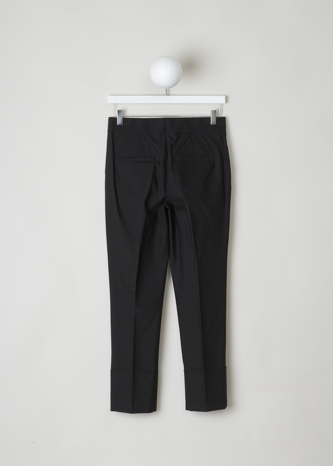 BRUNELLO CUCINELLI, BLACK PANTS WITH BEADED CLASP DETAIL, M0F70P7045_C101, Black, Back, These black pants come with an elastic waistband. They have a concealed zipper and clasp, adorned with a subtle beaded detail. These pants have two side slit pockets and two welt pockets on the back. The hem is finished with a broad fold-over.
