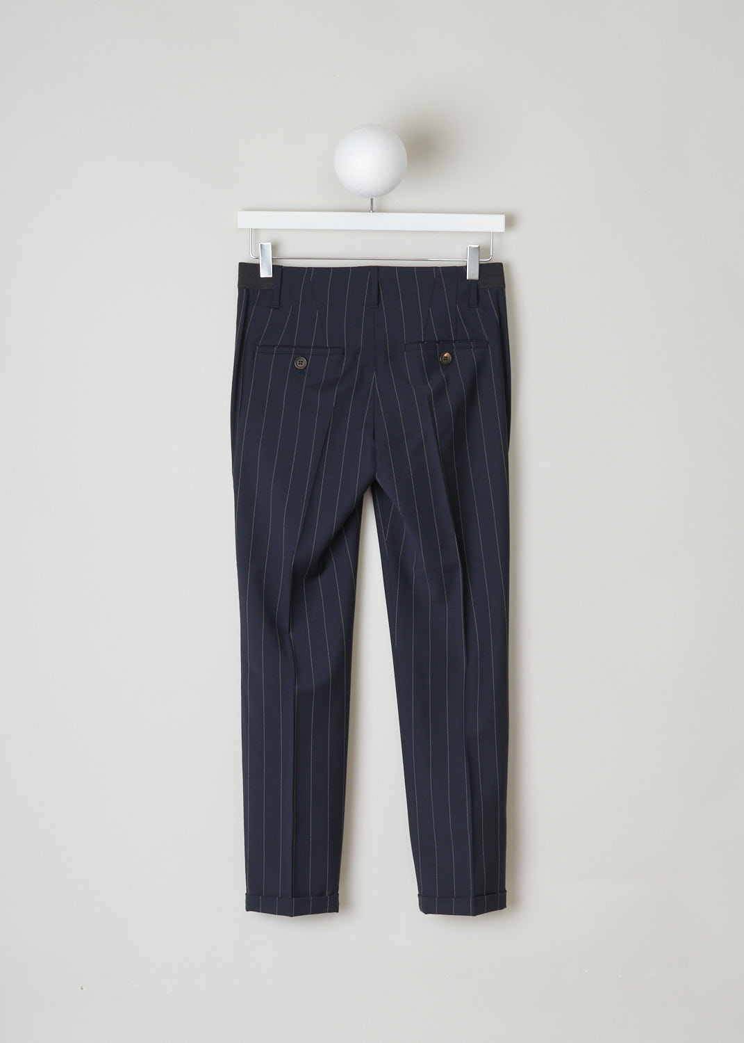 BRUNELLO CUCINELLI, NAVY BLUE TROUSERS WITH PINSTRIPE, M0H35P1500_C6009, Blue, Back, These navy blue pinstripe trousers are made of a wool blend. Featuring a partly elasticated waistline, forward slanted pockets in the front, and two buttoned welt pockets in the back. Along the length of the pant leg, centre creases can be found. These trousers have a folded hem.
