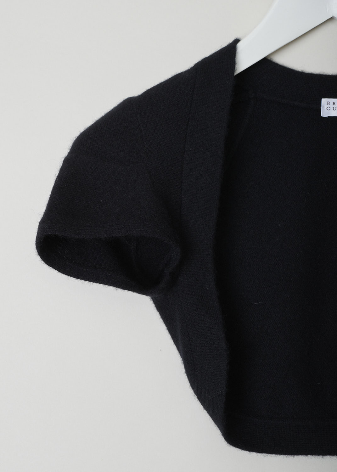 BRUNELLO CUCINELLI, BLACK SHORT SLEEVE BOLERO, M12105019_C101, Black, Detail, Black short-sleeve bolero with a ribbed hemline.  
