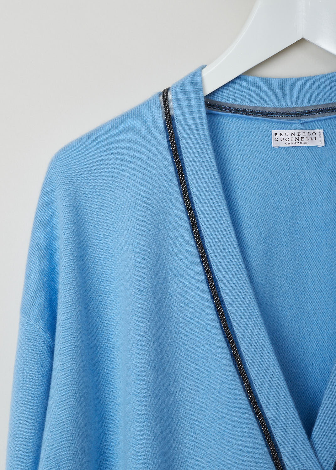 BRUNELLO CUCINELLI, BLUE CARDIGAN WITH BEADED TRIMS, M12167306_C9401, Blue, Detail, Light blue cardigan with a bead embellished trim. The cardigan had a front button closure with tortoise shell buttons.