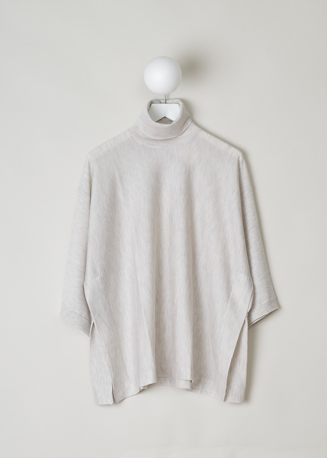 BRUNELLO CUCINELLI, MOTTLED BEIGE TURTLENECK, M13825504_C2796, Beige, Front, This mottled beige turtleneck top has three-quarter sleeves with ribbed cuffs. The top has side slits reaching to the sleeve. A single button can be used to slightly close the slit. The top has a wide silhouette. 

