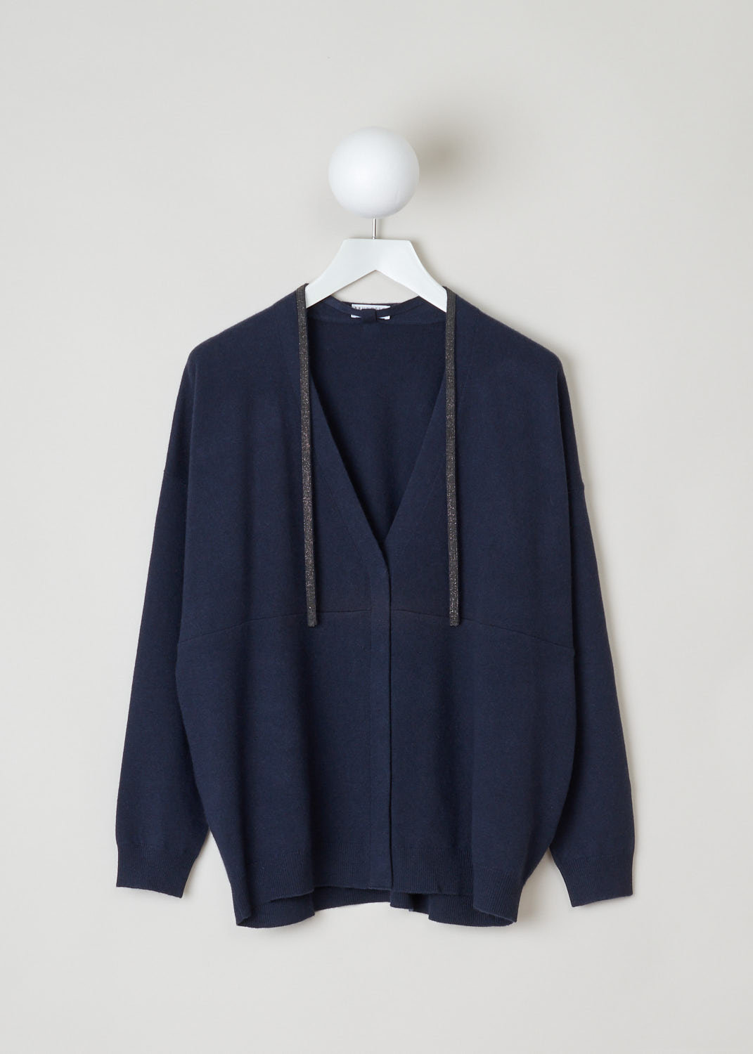 Brunello Cucinelli, Oversized navy cardigan, M16120506_CX033, blue, front, Navy colored cardigan featuring an oversized fit with long sleeves. Furthermore this cardigan comes with self-tie features being their signature line on beads. 