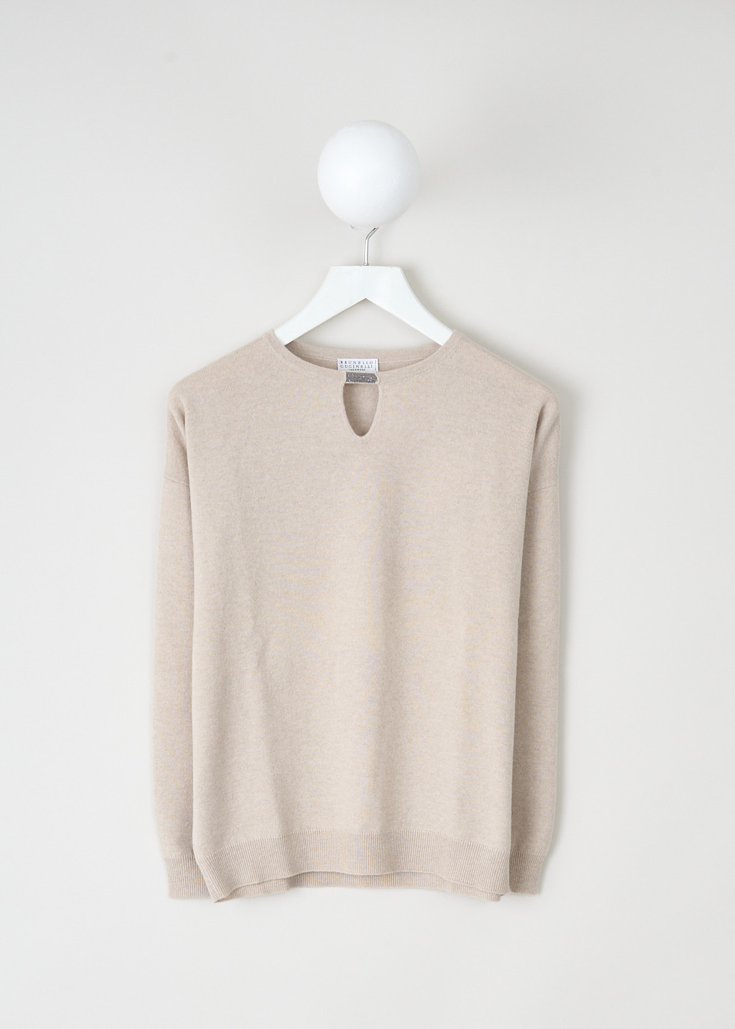 Brunello Cucinelli, Beige sweater with keyhole detail, M16125600_CJ780, Beige, Front, This beige cashmere sweater has round neckline with a monili-decorated keyhole detail. The sweater has long sleeves. Both the cuffs and the hem have a ribbed finish.

