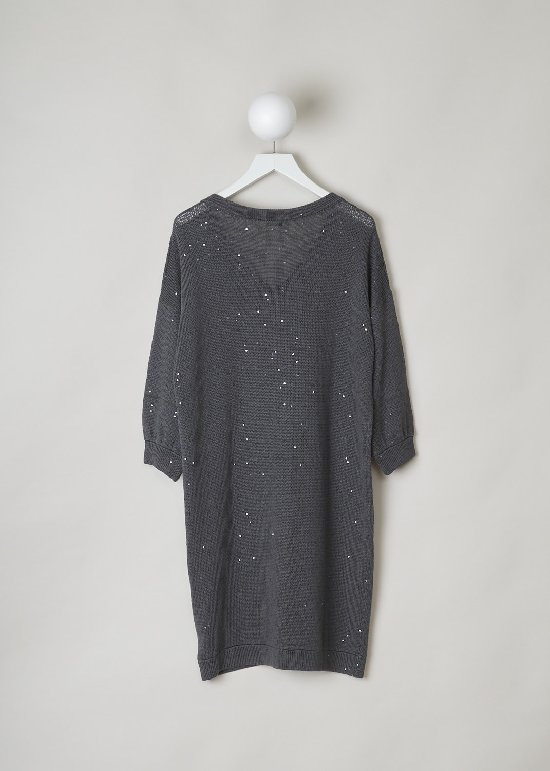 BRUNELLO CUCINELLI, GREY KNITTED SWEATER DRESS WITH SEQUINS, M70573A82_CJ079, Grey, Back, This grey knitted sweater dress has a V-neckline, dropped shoulders and three-quarter sleeves. The neckline, cuffs and hemline have a ribbed finish. The dress has sequins sewn in throughout and along the shoulders and across the sleeves, monili beaded strips can be found. The dress has a wider silhouette.  
