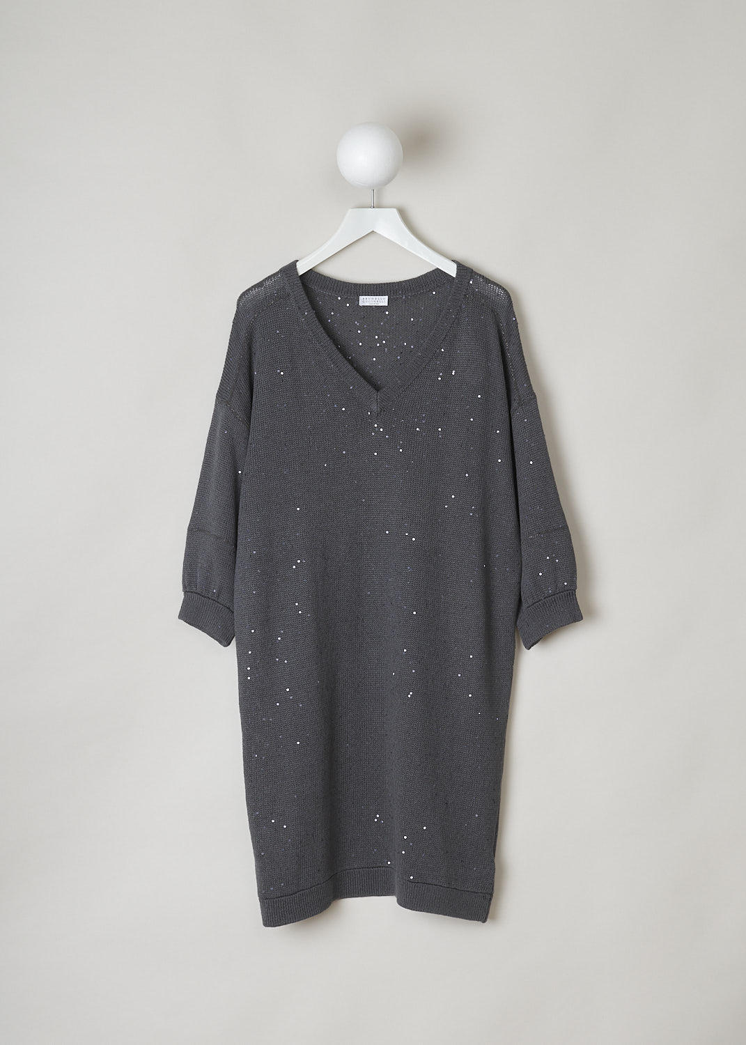 BRUNELLO CUCINELLI, GREY KNITTED SWEATER DRESS WITH SEQUINS, M70573A82_CJ079, Grey, Front, This grey knitted sweater dress has a V-neckline, dropped shoulders and three-quarter sleeves. The neckline, cuffs and hemline have a ribbed finish. The dress has sequins sewn in throughout and along the shoulders and across the sleeves, monili beaded strips can be found. The dress has a wider silhouette.  
