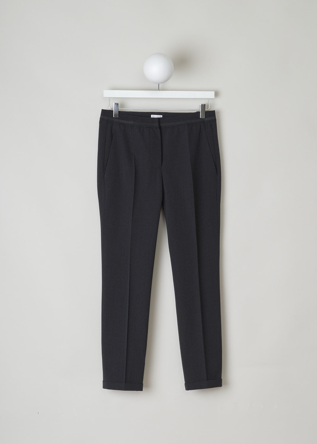 BRUNELLO CUCINELLI, DARK GREY PANTS WITH PARTIALLY ELASTICATED WAISTBAND, MA051P1500_CB415, Grey, Front, Dark grey pants with partly elasticated waistline. A clasp and zipper function as the closing option. These pants feature forward slanted pockets in the front, and two buttoned welt pockets in the back. Along the length of the pant leg, centre creases can be found. These pants have a folded hem.
