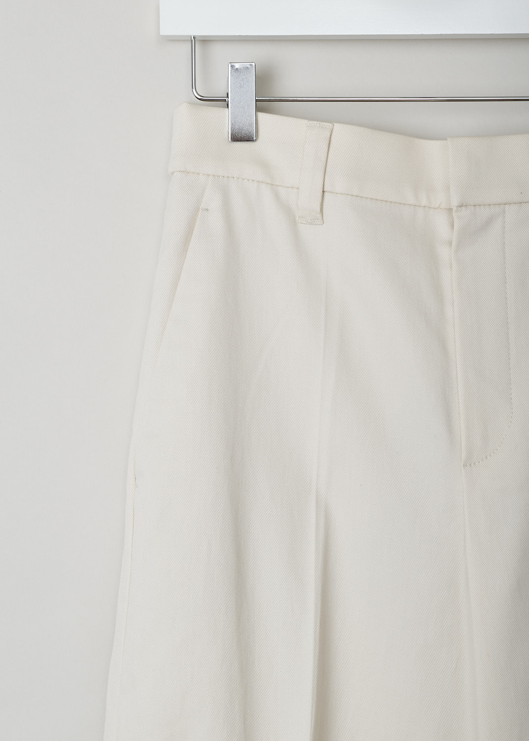 BRUNELLO CUCINELLI, BEIGE WIDE-LEG PANTS, MA130P7008_C7365, Beige, White, Detail, These beige pants have straight wider pant legs with a folded hem. The pant legs have pressed centre creases. The waistline has belt loops and is elasticated in the back. The closure option is a concealed hook and zipper. The pants have forward slanted pockets in the front and welt pockets in the back. 


