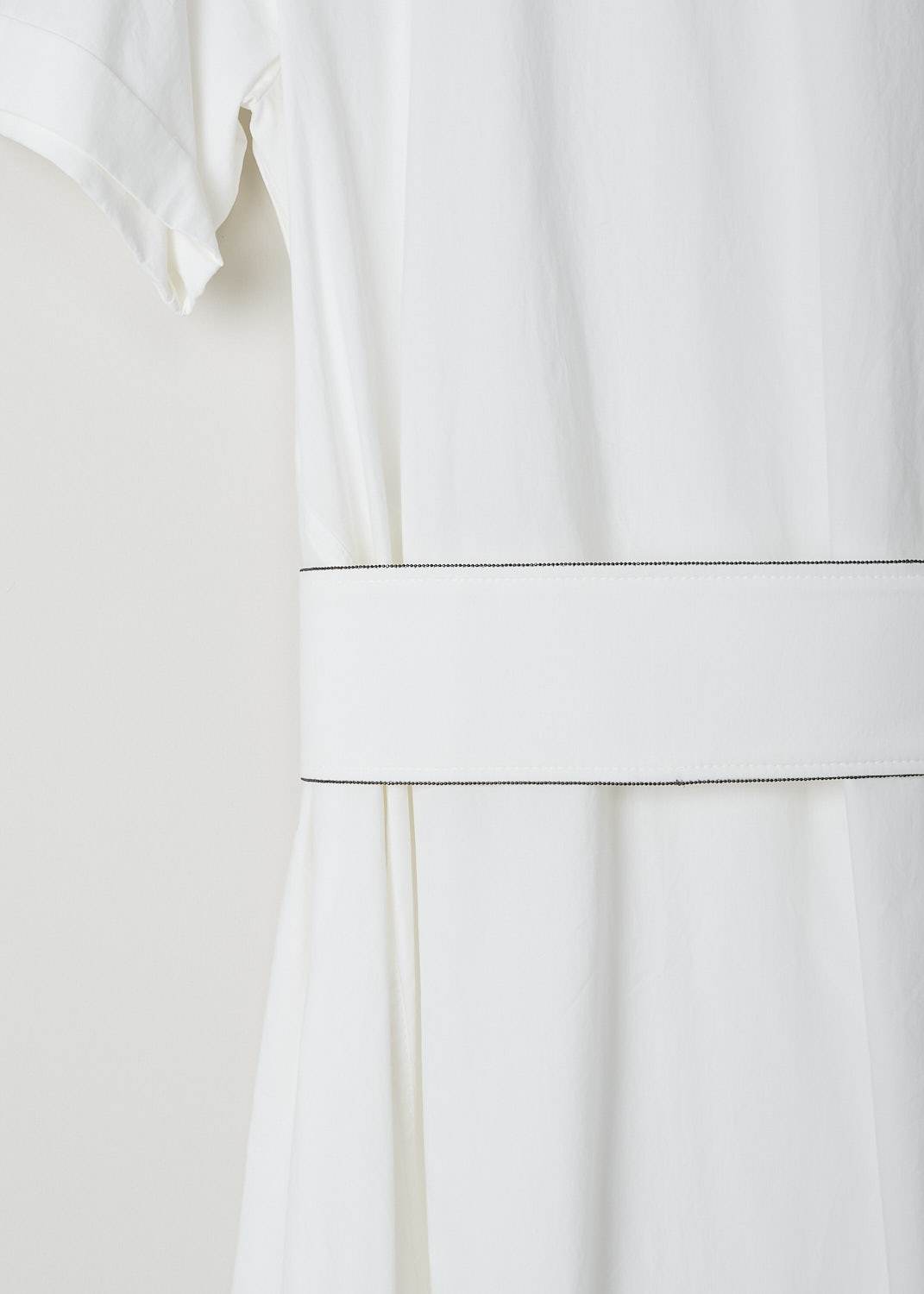 BRUNELLO CUCINELLI, WHITE MIDI DRESS WITH A HIGH-LOW SKIRT, MH127A4534_C600, White, Detail, This white midi dress has a round neckline and short sleeves with folded cuffs. The dress has a flared high-low skirt, meaning the hemline is shorter at the front and longer at the back. The broad fabric belt has a contrasting black monili trim and a D-ring belt buckle. The dress comes with a detachable underskirt with a broad elasticated waistband. The underskirt is attached with two buttons. In the back, a concealed centre zip functions as the closure option. 
