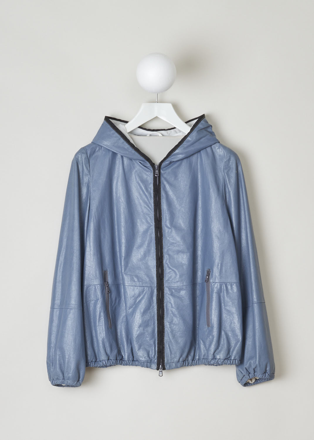 BRUNELLO CUCINELLI, HOODED LEATHER JACKET WITH EMBELLISHMENTS, MPBIS8276_C6173, Blue, Grey, Front, This sporty leather jacket features a hood with a subtle bejeweled trim that extends down along the zipper. The cuffs and the hem have an elastic band, cinching them in. Two welt pockets with zippers can be found on the front of the jacket. 
