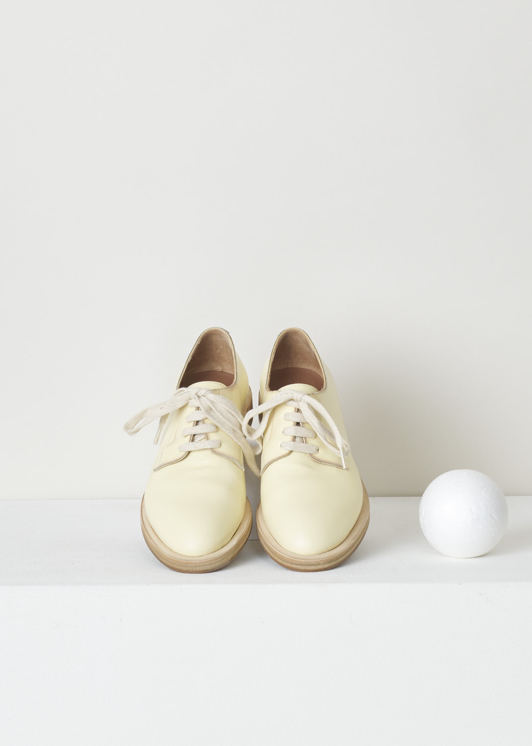 BRUNELLO CUCINELLI, PALE YELLOW DERBY SHOE, MZDVLC113_C6059, Yellow, Top, Pale yellow leather derby shoes with a shiny finish. This model has a classic lace-up closure. These shoes have a rounded toe. The sole is a contrasting dark brown color. 

Heel height: 1.5 cm / 0.5 inch
