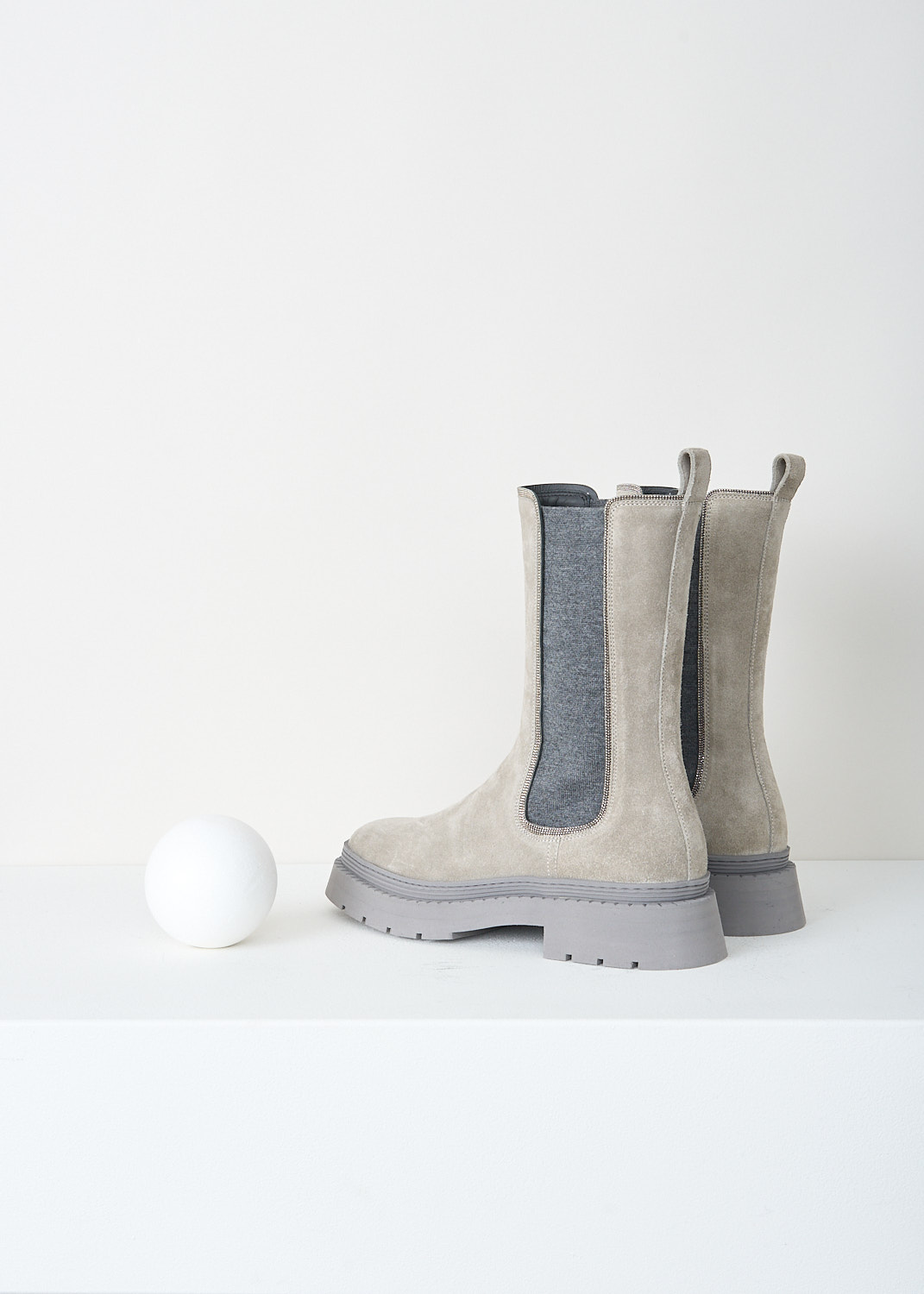 Brunello Cucinelli, Grey suede Chelsea boots, MZSFG2041_CWU70, Grey, Back, These light grey suede boots feature dark grey elastic gusseted sides accented with monili trim. They have a round toe and grey rubber soles.
