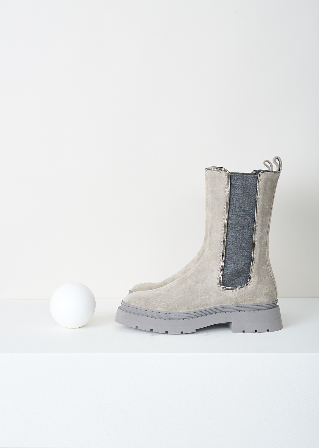 Brunello Cucinelli, Grey suede Chelsea boots, MZSFG2041_CWU70, Grey, Side, These light grey suede boots feature dark grey elastic gusseted sides accented with monili trim. They have a round toe and grey rubber soles.
