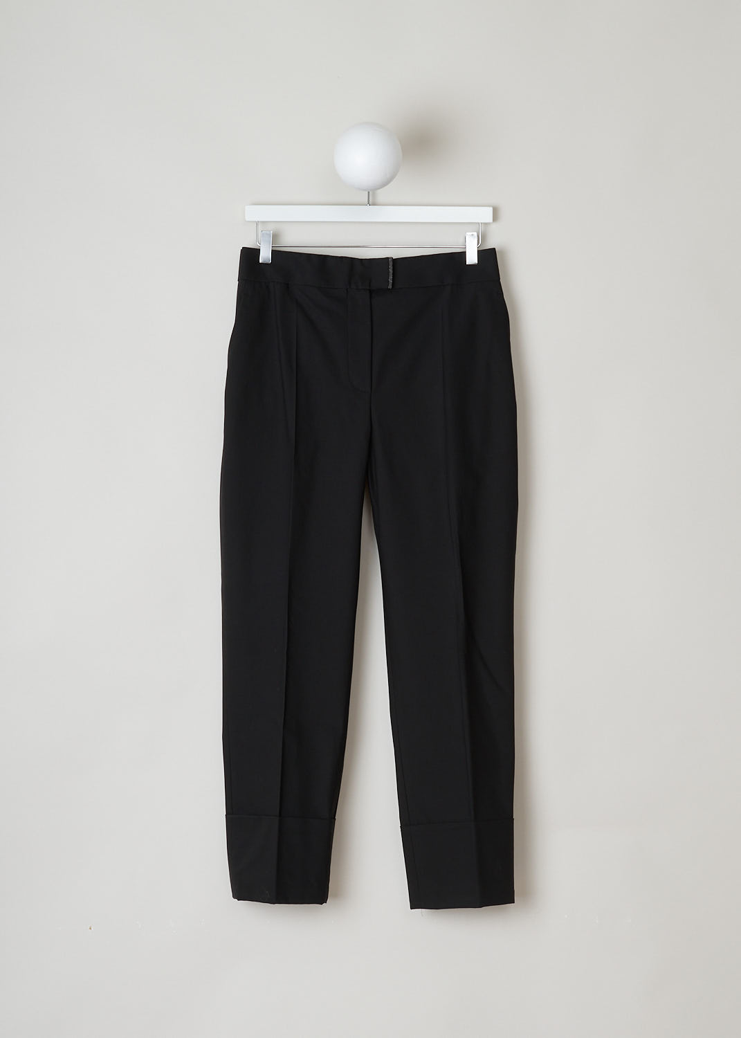 BRUNELLO CUCINELLI, BLACK PANTS WITH BEADED CLASP DETAIL, M0F70P70_C101, Black, Front, This beautiful black pants comes with an elastic waistband. It has a concealed zipper and clasp, adorned with a subtle beaded detail. The pants has two side slit pockets and two welt pockets on the back. Furthermore, the hem is finished with a broad fold-over.