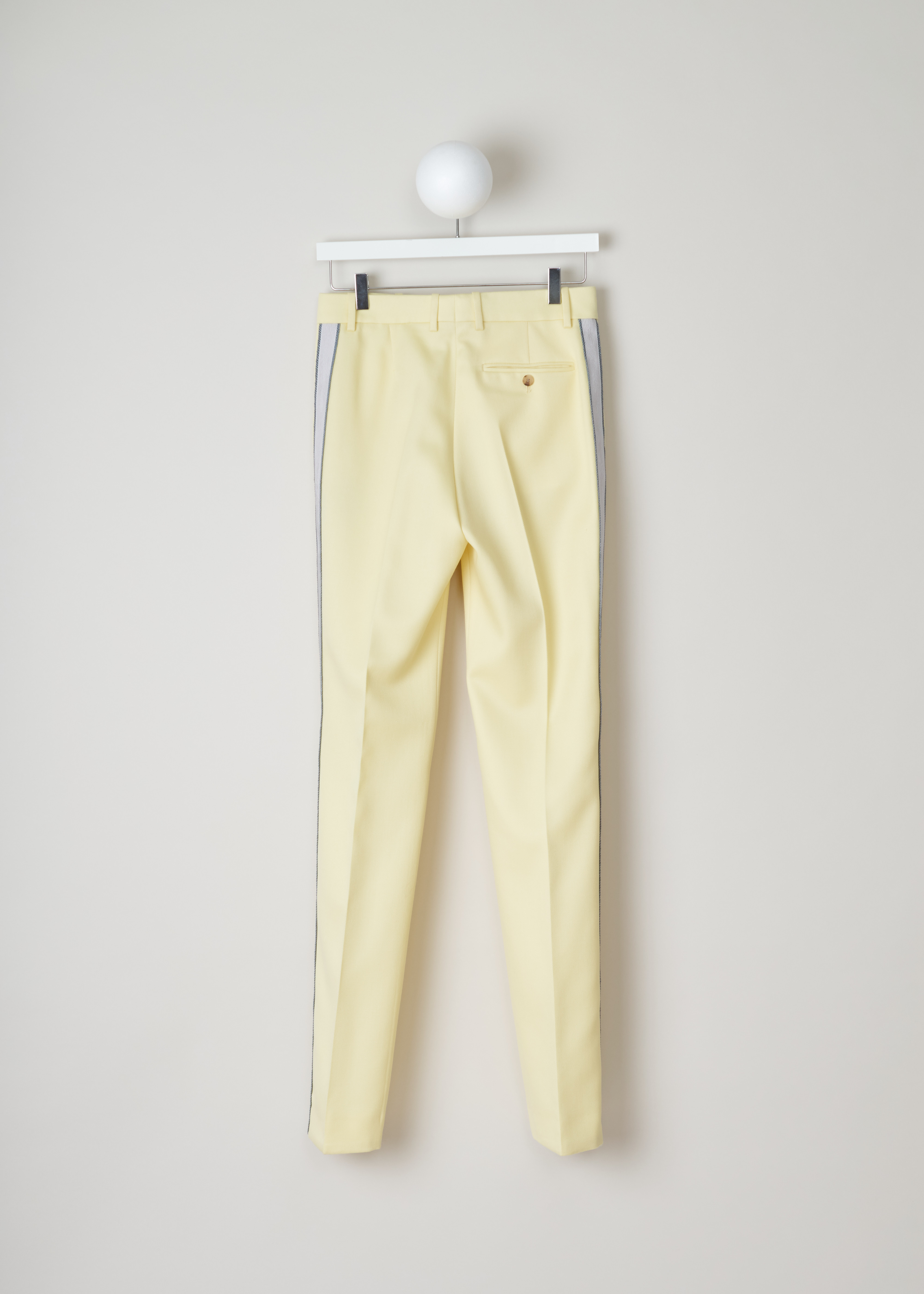 Calvin Klein 205W39NYC Yellow pants with ribbon trim 84WWPB22_W037_764 light yellow pearl back. Yellow trousers with side piping in white and blue, centre creases, side pockets and a welt pocket on the back.