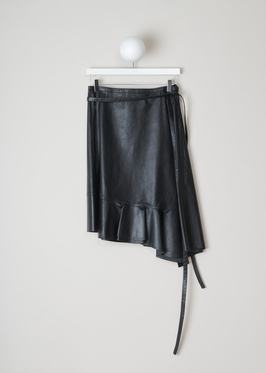 CÃ©line, Asymmetrical black leather wrap skirt, 045A_22081_ONO_C01, black, back, Wrap skirt crafted in calf leather, the softest kind of leather. This model features a backing button on the inside. Beside that, it has two leather ribbons that can be used as fastening option, or can be tied in various decorative knots. Furthermore, this model has concealed pockets on the side seam.