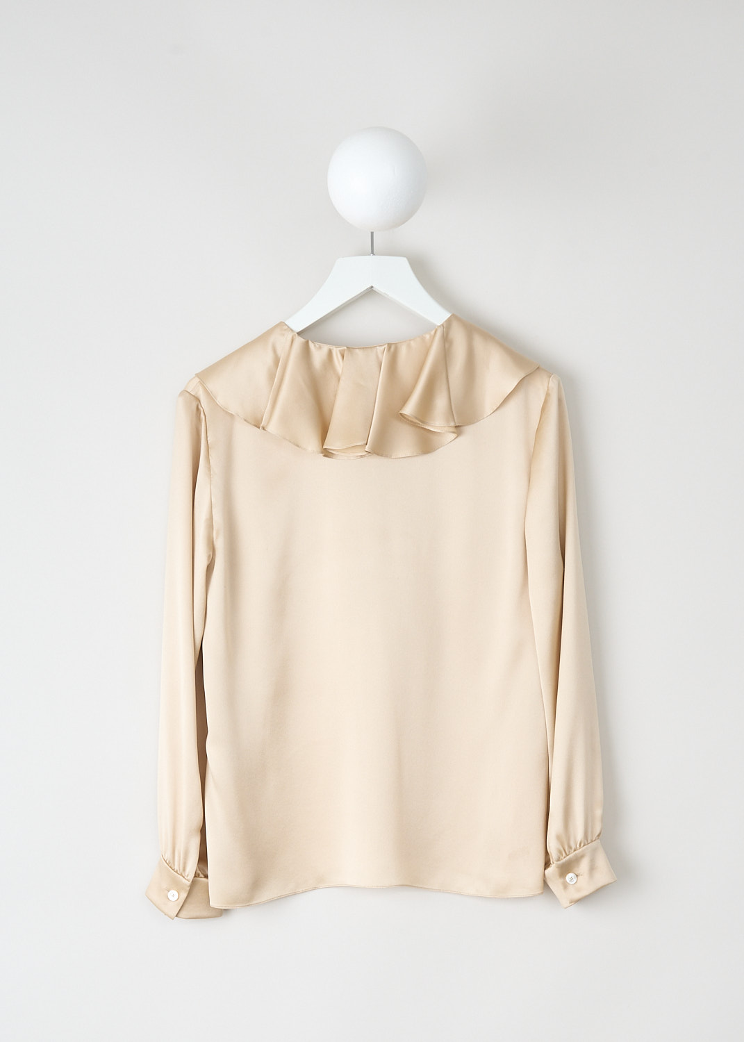 Back view of Celine champagne satin silk blouse with flowy silhouette and asymmetric hemline, available at Kiki’s Stocksale Maastricht designer boutique