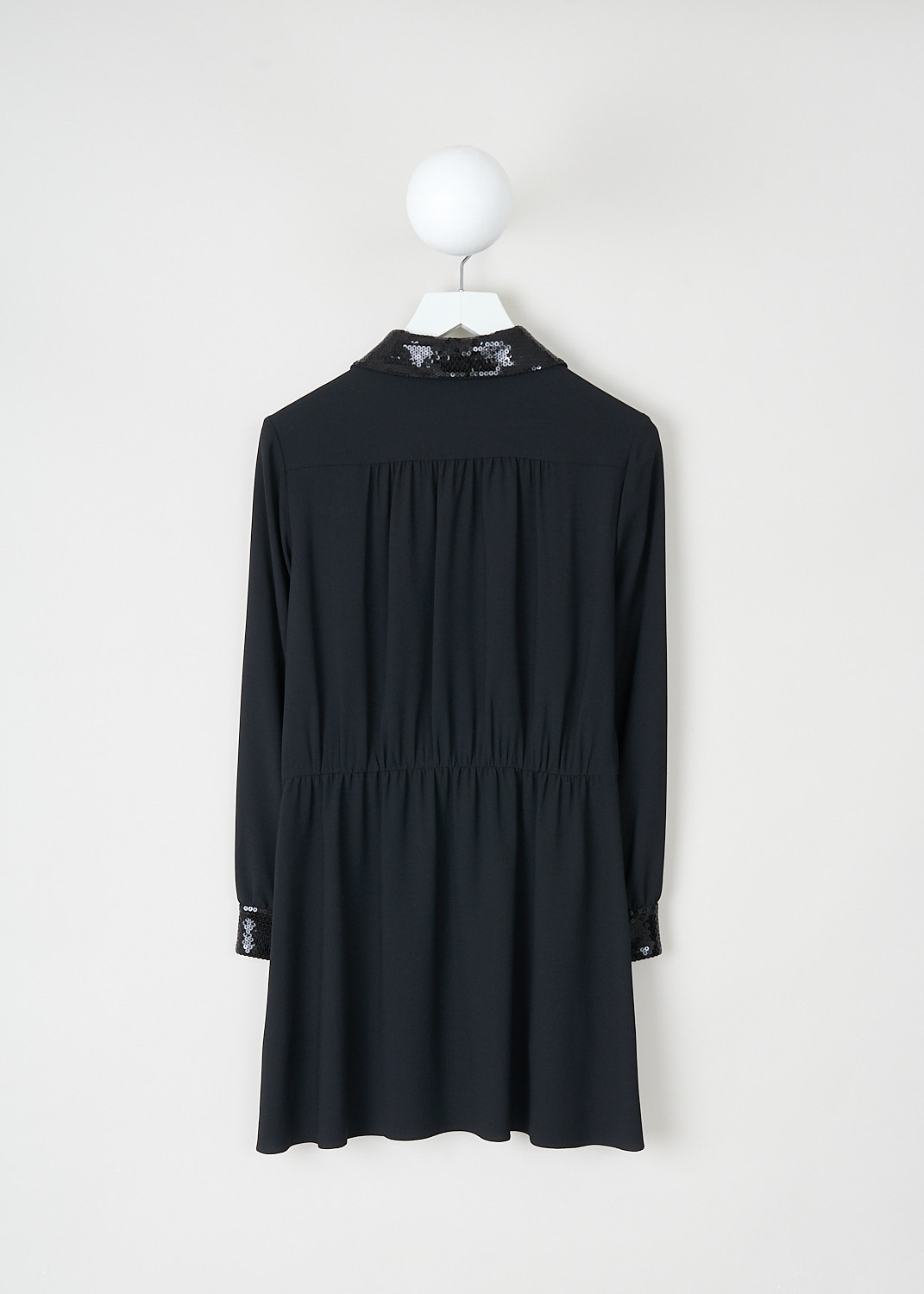 Celine, Black dress with sequins detailing, 2R25K_865C_38NO, Black, Back, This black mini dress features a sequin-clad Claudine collar and a partial front button closure with gold-tone buttons. The long sleeves are finished with sequin-clad cuffs. On the bodice, there are two patch pockets accented with broad sequin trim. The dress has a flared skirt.
