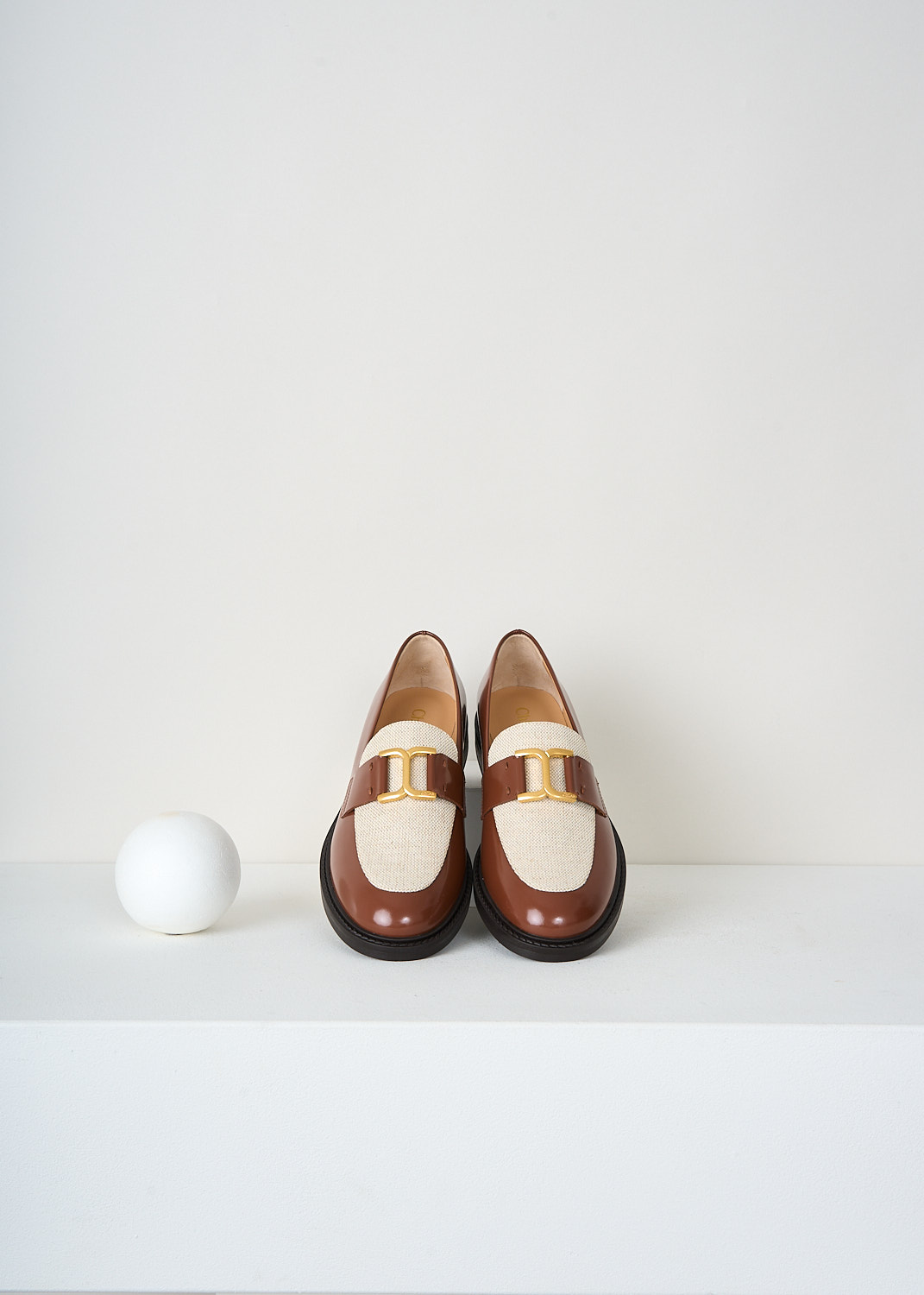 Chloé Marcie two-tone leather loafers in Cognac Brown with decorative vamp strap and signature gold-tone Chloé logo, premium designer footwear at Kiki's Stocksale