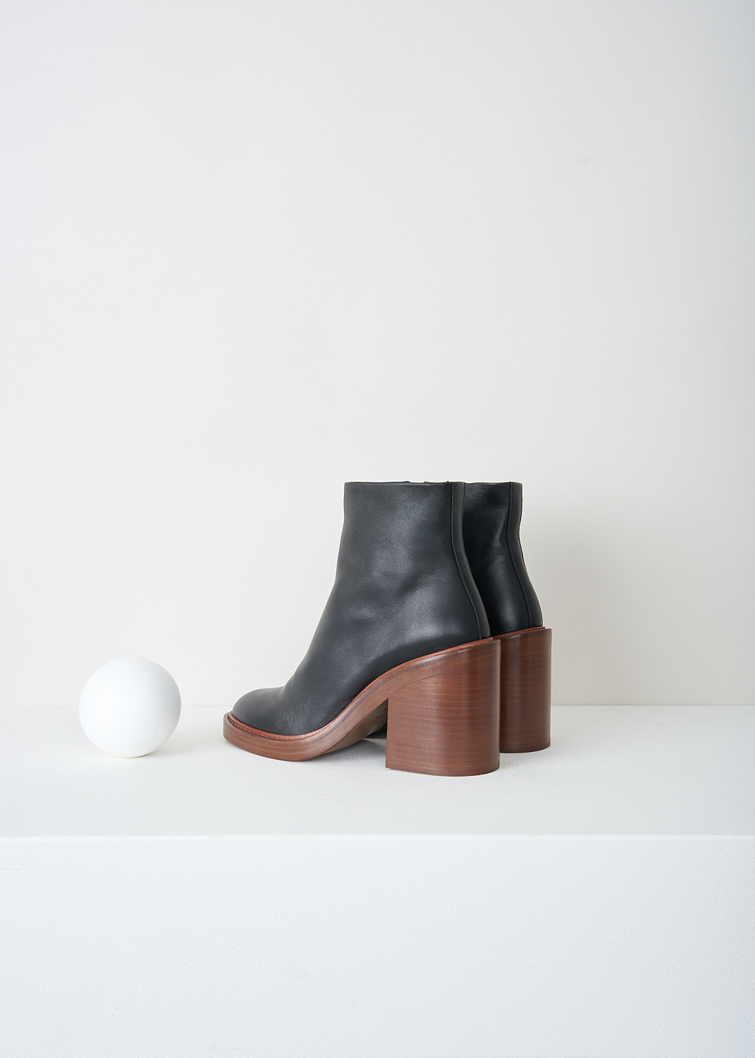 Chloé, Black ankle boots with brown sole, CHC22A69484001_BLACK, Black, Brown, Back, These black ankle boots have a zip closure on the inside of the leg. These boots have a round toe and a brown stacked block heel.
