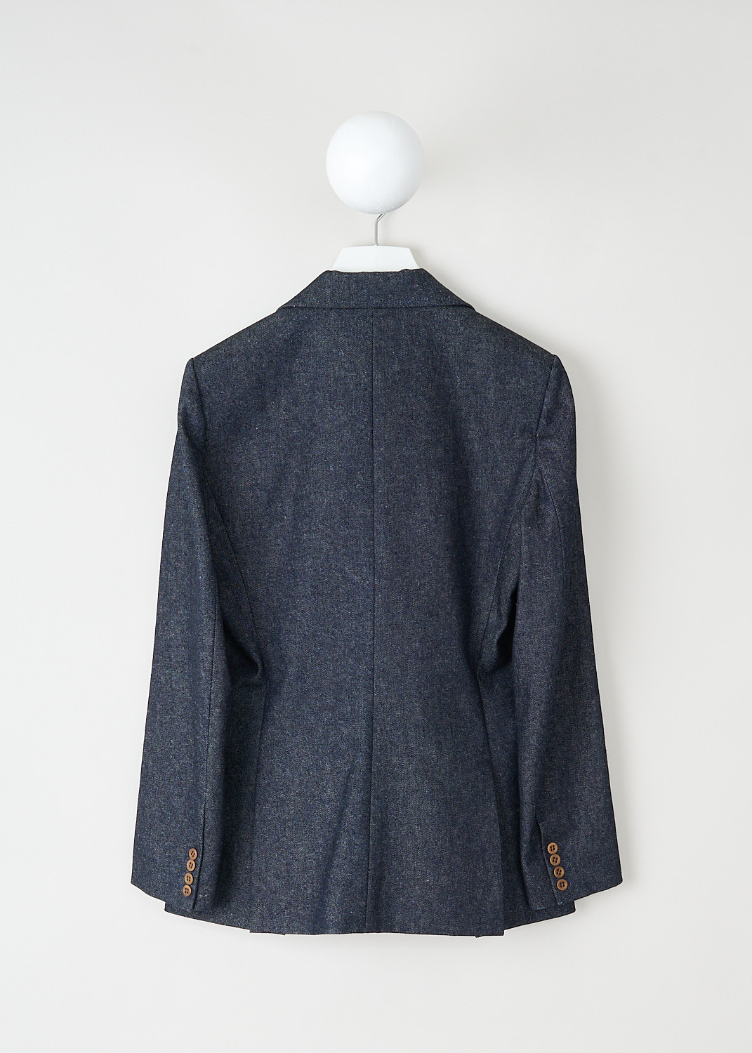 Chloé, Iconic navy denim jacket, CHC22ADV6115748A_ICONIC_NAVY, Blue, Back, This iconic navy single-breasted denim jacket has a notched lapel and a front button closure. The long sleeves have buttoned cuffs. The jacket has a single breast pocket and two flap welt pockets. The jacket has a straight hemline with a double vent. The jacket is fully lined.


