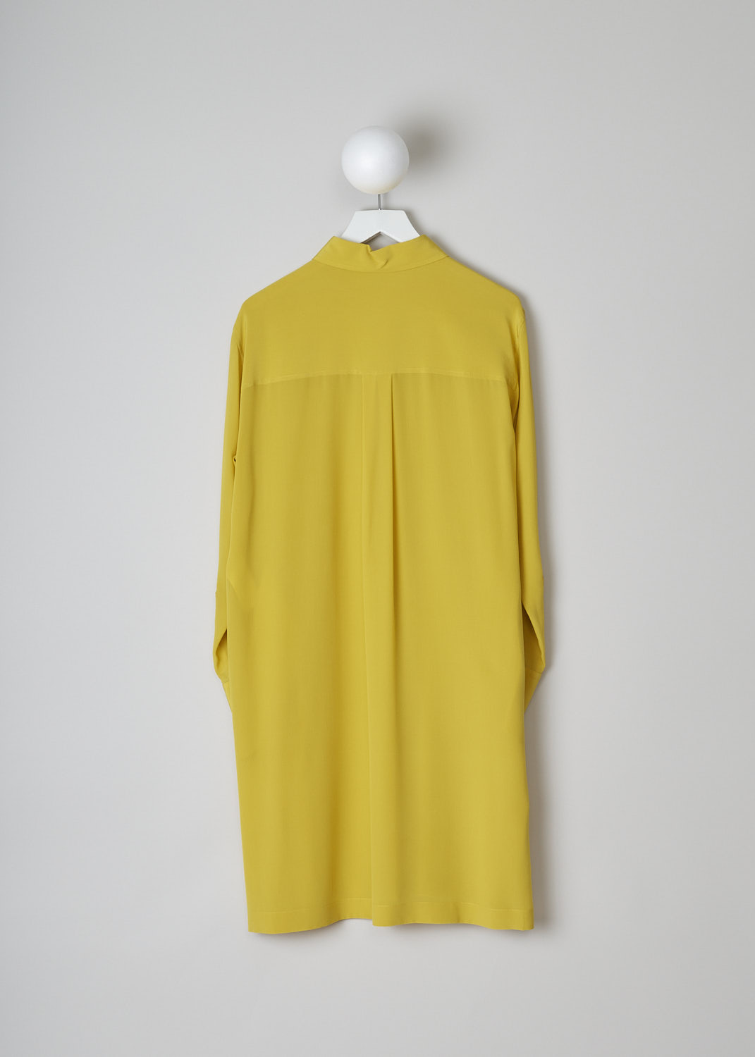CHLOÉ, MUSTARD YELLOW DRESS, CHC22URO64004732_MUSTARD, Yellow, Back, This mustard yellow shirt dress has a spread collar and a front button placket with ceramic buttons that reaches about halfway down. The long sleeves have cuffs with those same ceramic buttons. Slanted pockets are concealed in the side seam. The dress has a straight hemline with side slits. In the back, the dress has a centre box pleat. 
 
