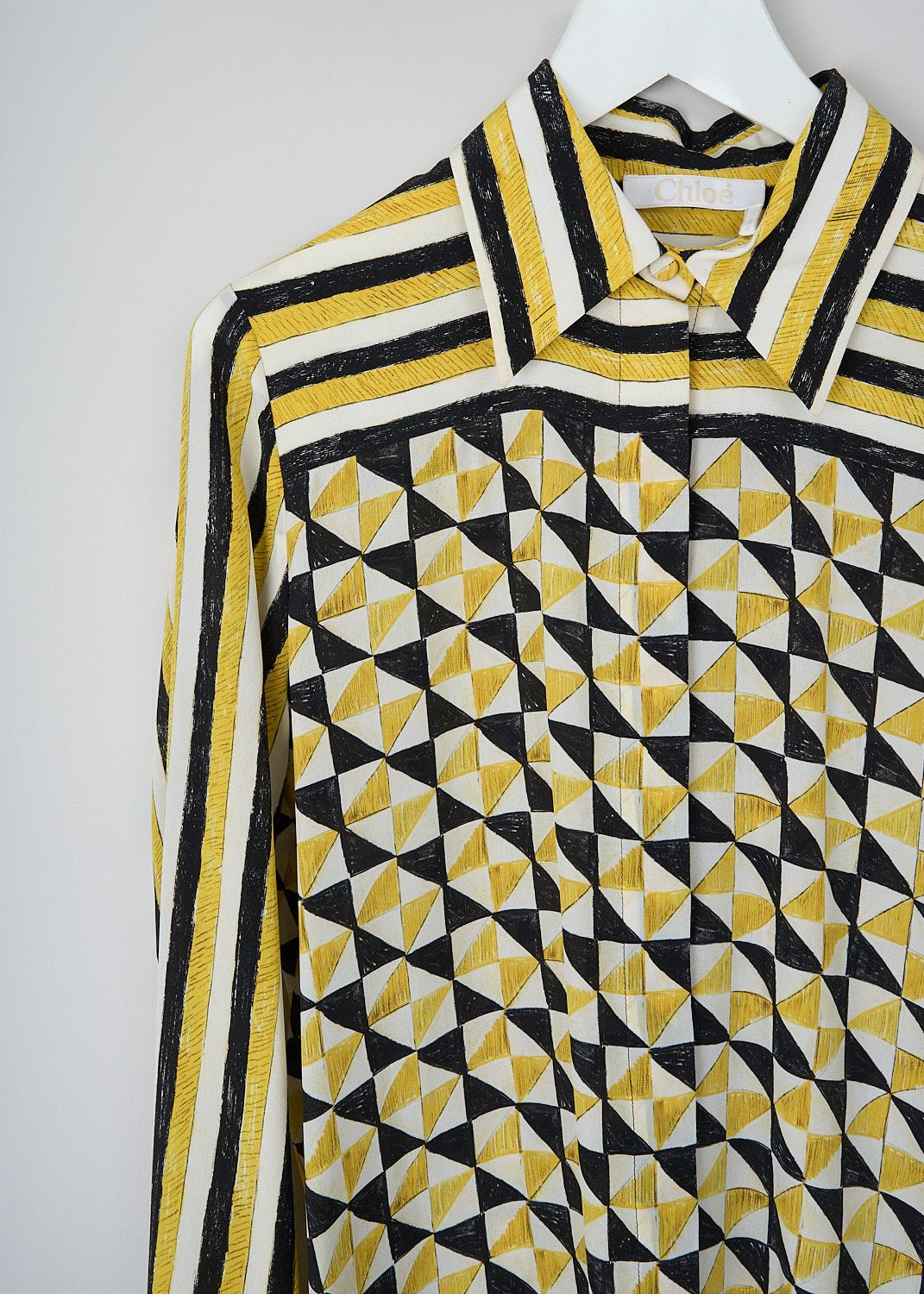 Chloé, Yellow geometric-print blouse, CHC23AHT403139CB_MULTICOLOR_2, Yellow, Print, Detail, This yellow geometric-print blouse has a spread collar and a concealed front button closure. The long sleeves have buttoned cuffs. The blouse has a rounded hem. In the back, the blouse has a single box pleat. 
