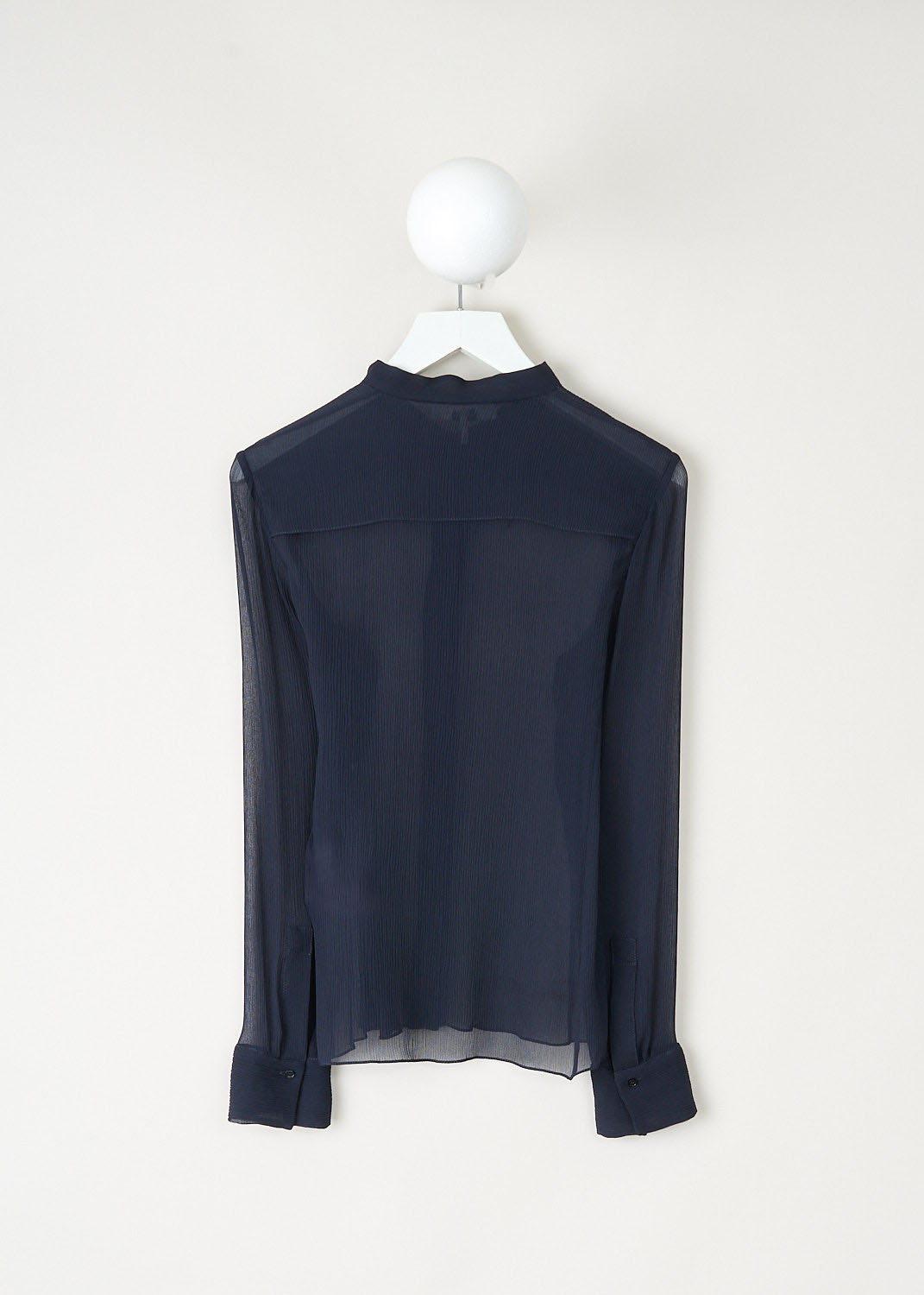 Back view of Chloé graphite blue sheer top with long sleeves and buttoned cuffs, available at Kiki's Stocksale designer outlet in Maastricht.
