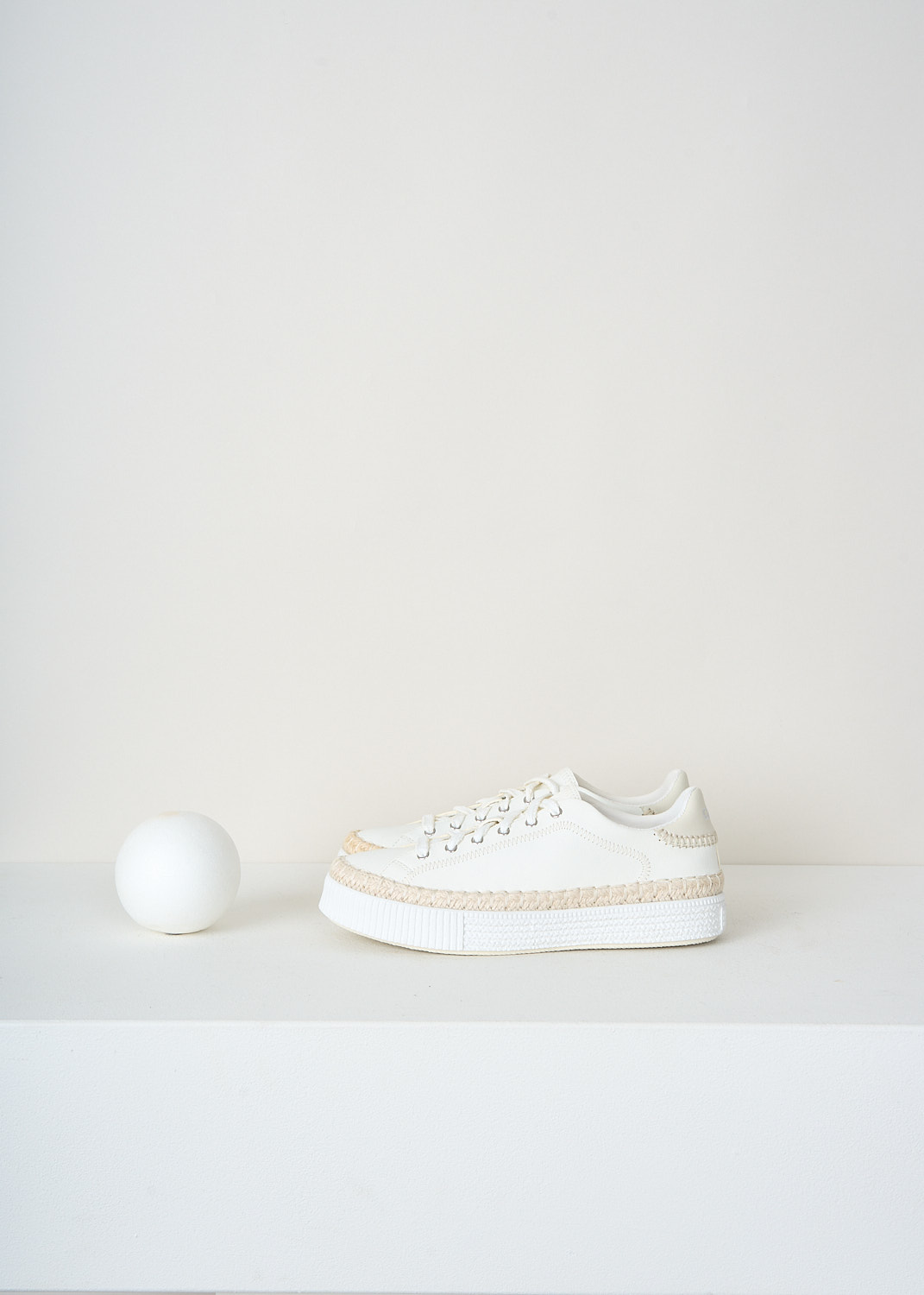 Chloé Telma white leather sneakers with hand-stitched trim around the sole and classic lace-up design, luxury designer footwear at Kiki's Stocksale Maastricht